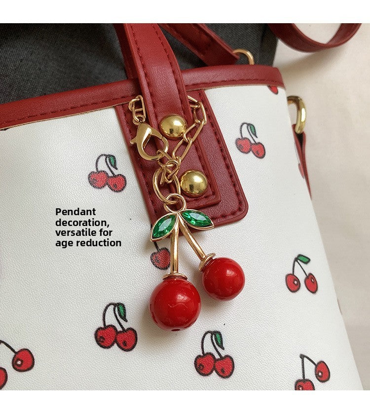 Women PU Cherry Shoulder Bag Large Capacity Trendy Commuting Bag with Cherry Pendant Stylish Crossbody Bag Aesthetic Handbag