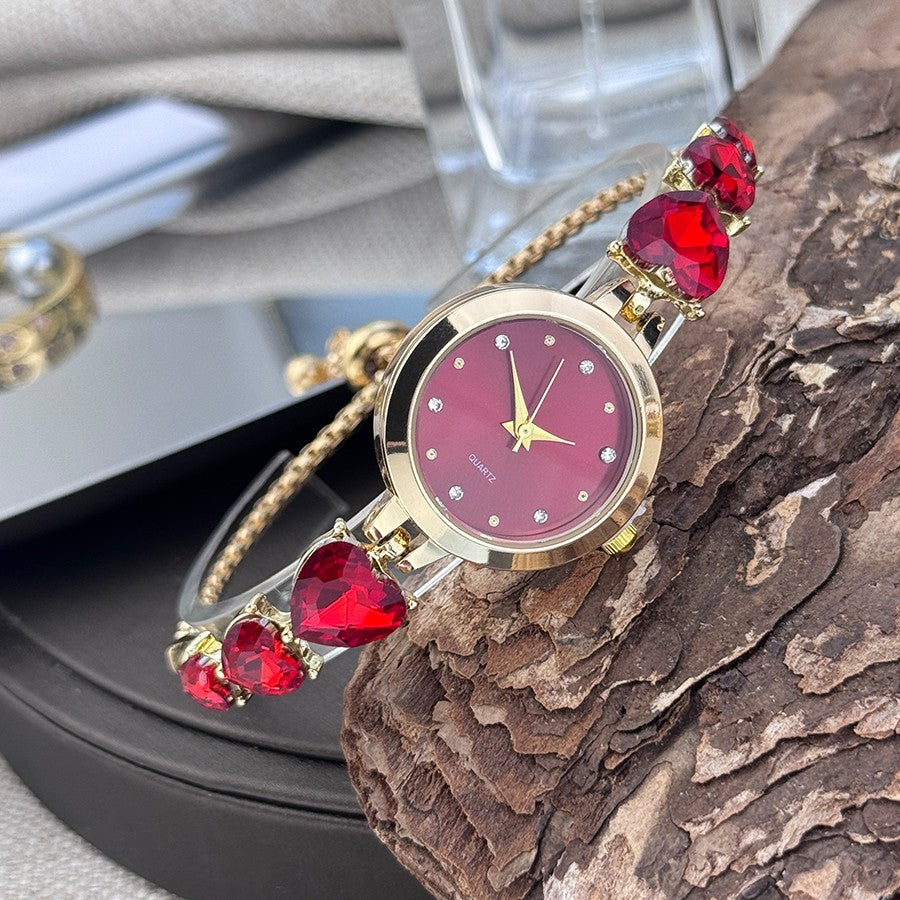 Ladies' quartz watch with three heart-shaped diamond-encrusted bracelet round alloy case and mixed scale simple light luxury