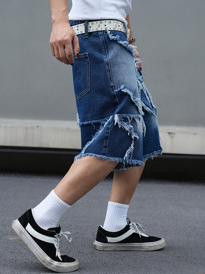 Men's tattered denim shorts with adhesive tape
