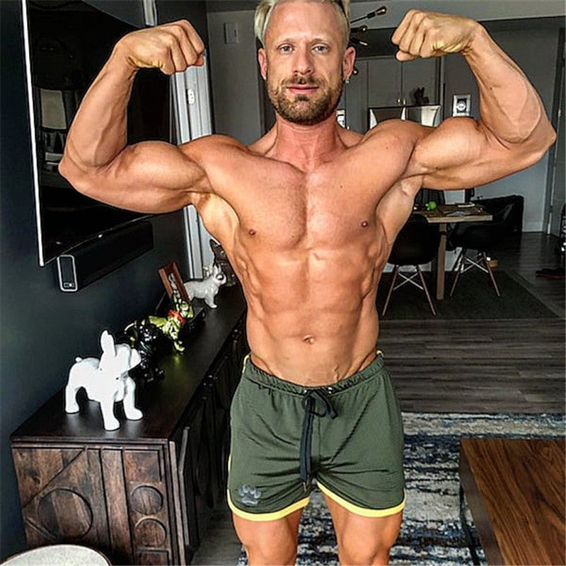 Men Gym Fitness Shorts Bodybuilding sports Jogging shorts Male 2022 Summer Cool Breathable Mesh The big size casual men Shorts