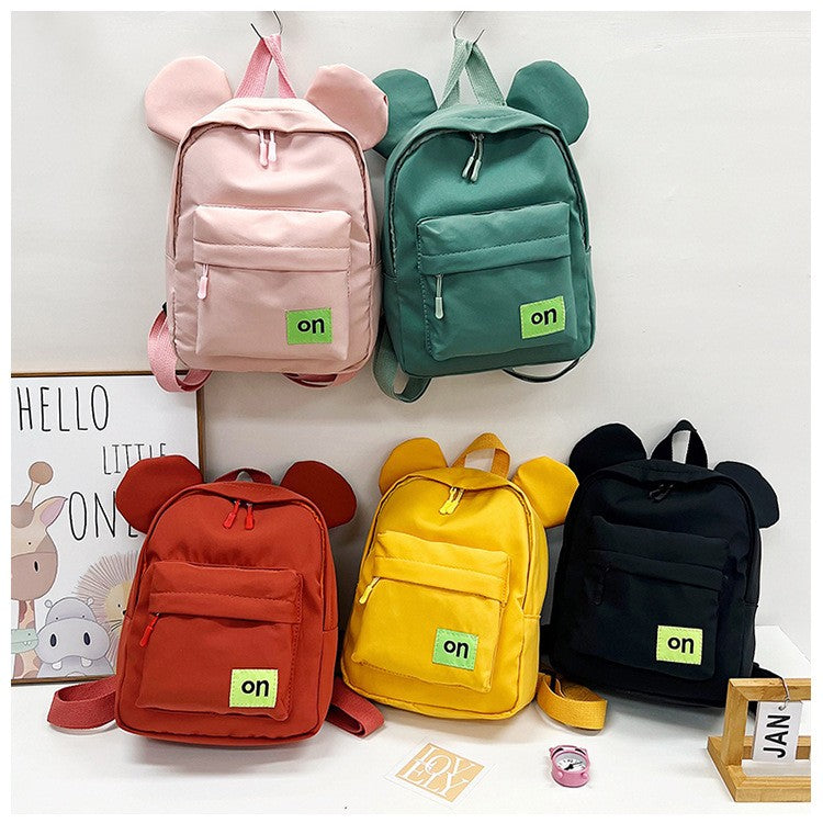 Mochila infantil fofa estilo novo para meninos e meninas estudantes do jardim de infância mochila escolar casual de cor sólida