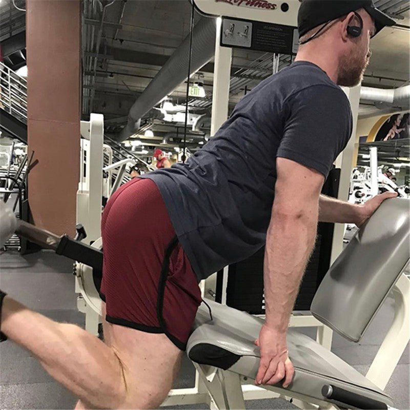 Men Gym Fitness Shorts Bodybuilding sports Jogging shorts Male 2022 Summer Cool Breathable Mesh The big size casual men Shorts