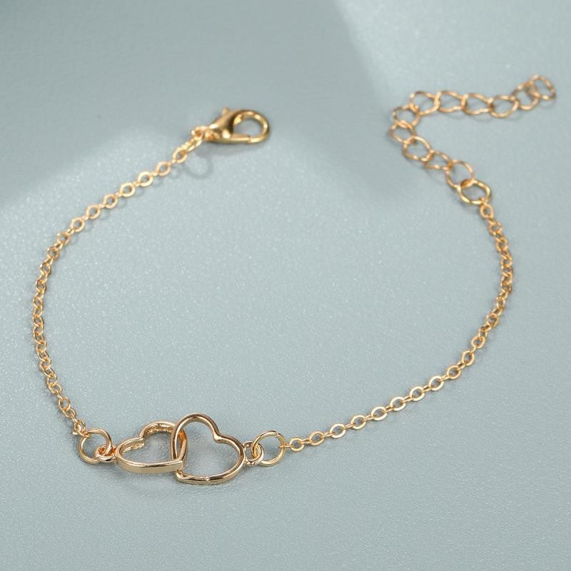 Pulseira Estilo Simples Vendas Coração a Coração Combinando Dupla Pequena Pulseira de Coração Oco Moda 2024 Novo Temperamento