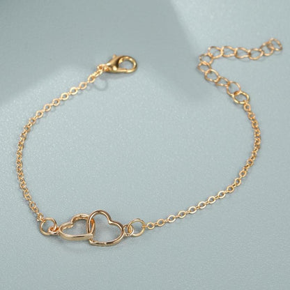 Pulseira Estilo Simples Vendas Coração a Coração Combinando Dupla Pequena Pulseira de Coração Oco Moda 2024 Novo Temperamento