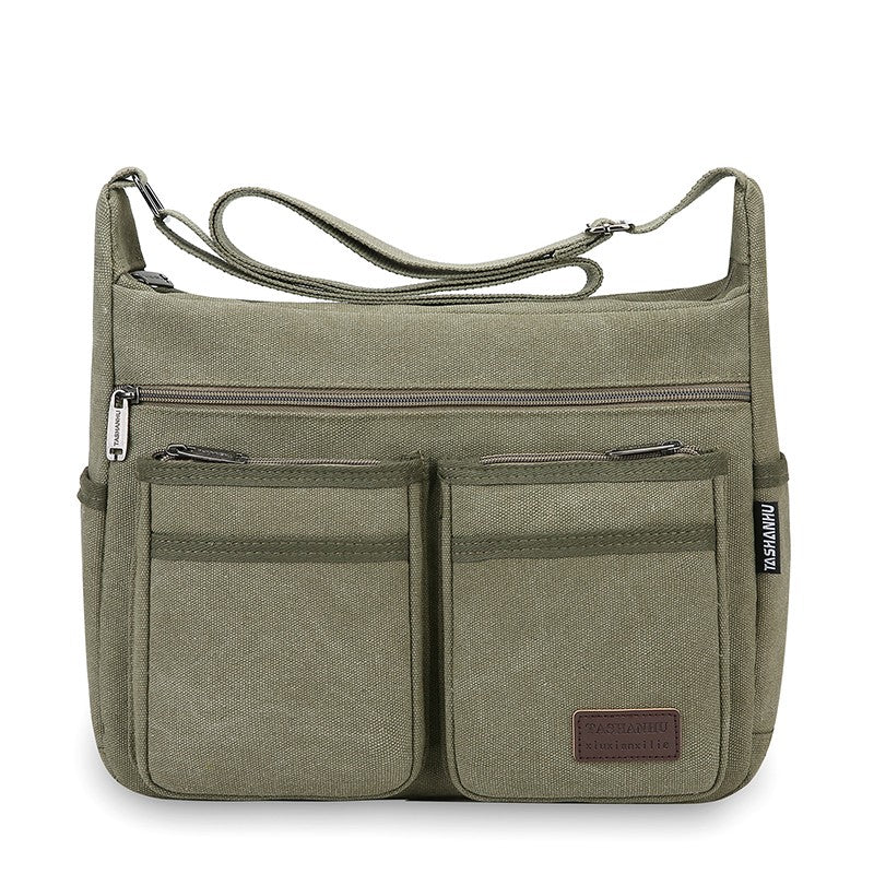 Neutral business casual crossbody bag - adjustable shoulder straps, multiple zippered compartments, durable black polyester lini