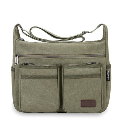 Neutral business casual crossbody bag - adjustable shoulder straps, multiple zippered compartments, durable black polyester lini