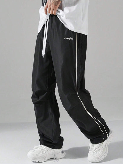 Men's Casual Letter Pattern Contrast Piping Drawstring Waist Trousers
