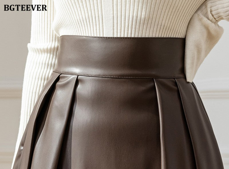 BGTEEVER Spring Autumn Loose PU Leather A-line Skirts Women Elegant High Waist Pleated Faux Leather Skirts Female