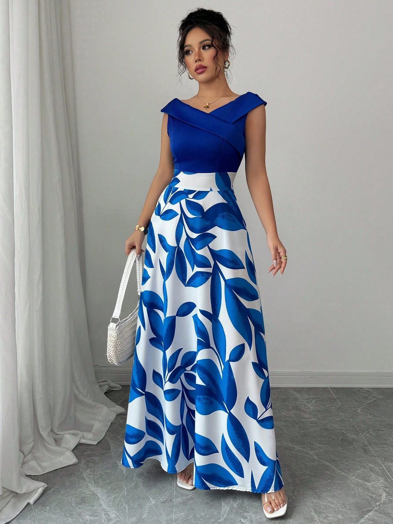 Women's Blue White Floral Maxi Dress Asymmetric Neckline Color Block Design Ideal for Evening Events Garden Parties Elegant Styl