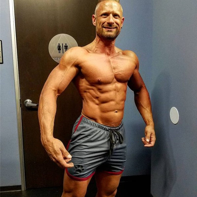 Men Gym Fitness Shorts Bodybuilding sports Jogging shorts Male 2022 Summer Cool Breathable Mesh The big size casual men Shorts