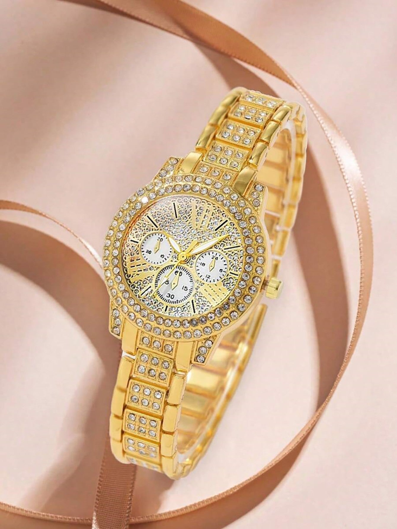 Luxurious ladies' quartz watch and jewelry set with intricate engravings, a birthday gift, and an elegant outfit for a party.