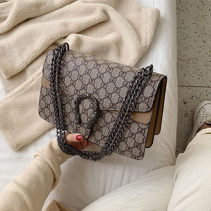 Retro PU women's crossbody bag with magnetic snap button, lightweight shoulder bag and multi compartment daily essentials