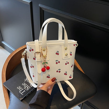 Women PU Cherry Shoulder Bag Large Capacity Trendy Commuting Bag with Cherry Pendant Stylish Crossbody Bag Aesthetic Handbag