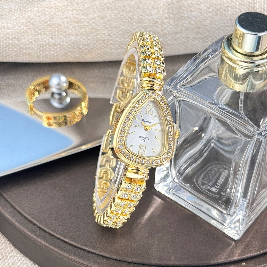 Women's diamond-set snakehead alloy case Sun stripe stripe scale diamond-set fine bracelet quartz watch luxury women's watch