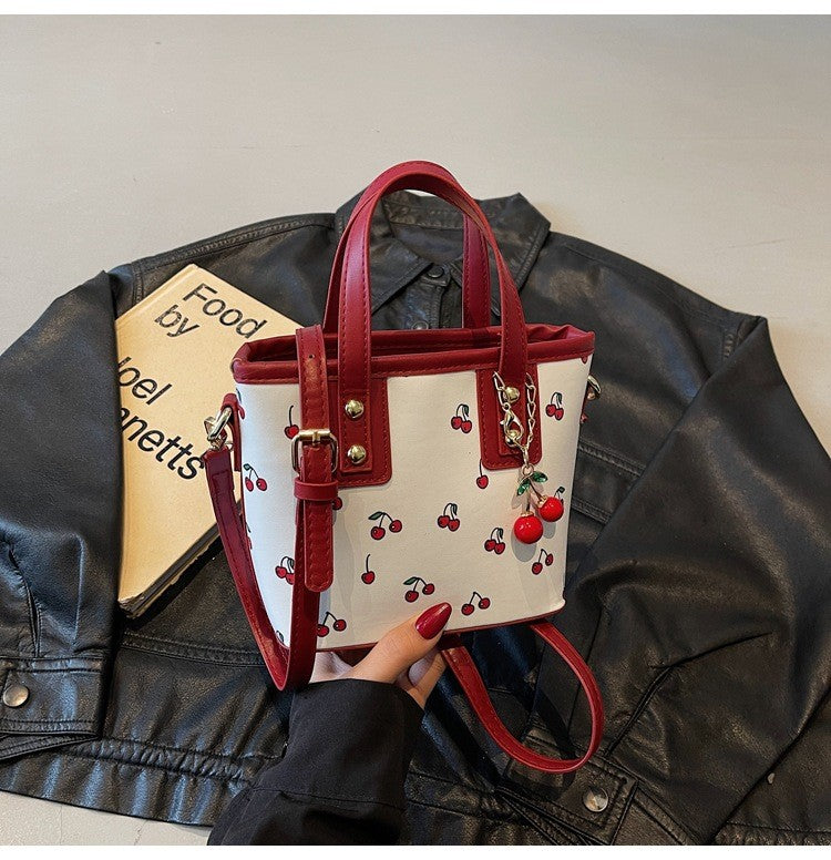 Women PU Cherry Shoulder Bag Large Capacity Trendy Commuting Bag with Cherry Pendant Stylish Crossbody Bag Aesthetic Handbag