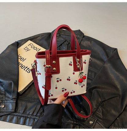 Women PU Cherry Shoulder Bag Large Capacity Trendy Commuting Bag with Cherry Pendant Stylish Crossbody Bag Aesthetic Handbag
