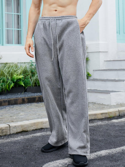 25 European and American men's waist trousers waist drawstring straight wide-leg loose trousers sports trousers pocket men pants