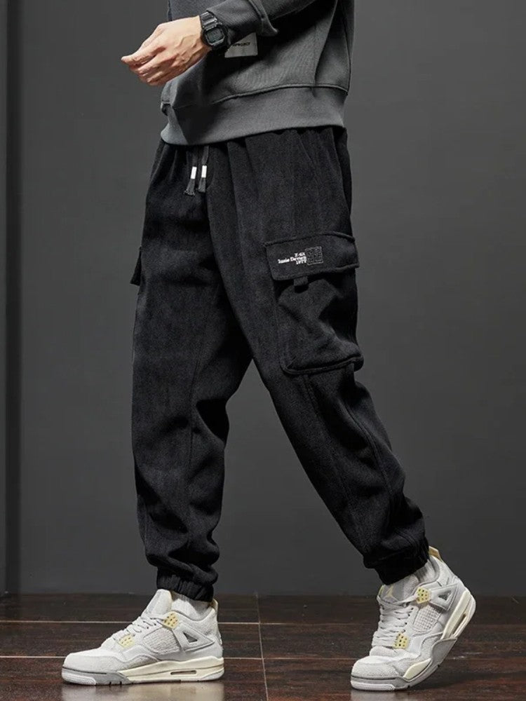 Calça Casual Masculina Elástico na Cintura Primavera Outono Estilo Novo Calça Esportiva Harem Jogger Reta com Cordão Elástico Masculina