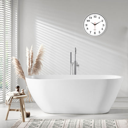 An 8-inch silent wall clock, modern white wall clock with simple design, battery operated quartz clock, adorns the family living