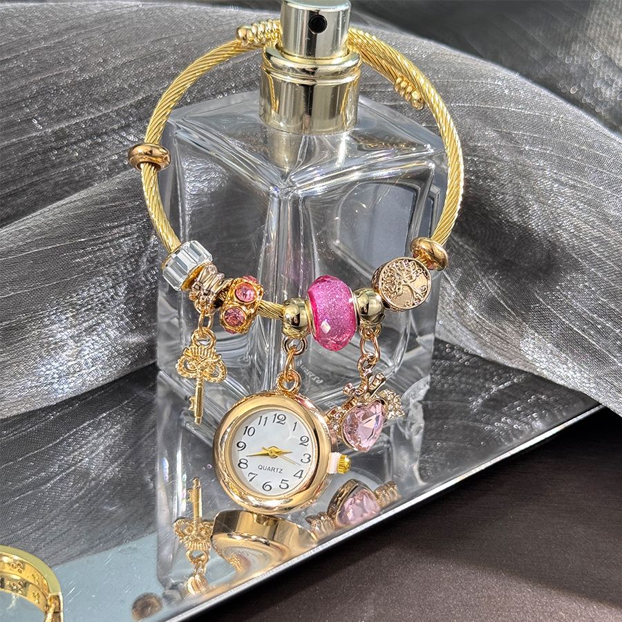 Cross-border Gold Bracelet Watch Adjustable opening Alloy bracelet Quartz Watch Beaded Small flower bracelet Watch