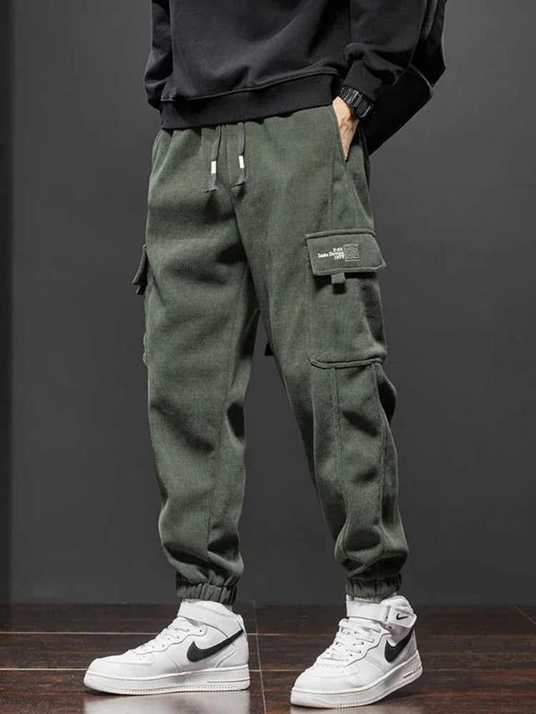 Calça Casual Masculina Elástico na Cintura Primavera Outono Estilo Novo Calça Esportiva Harem Jogger Reta com Cordão Elástico Masculina