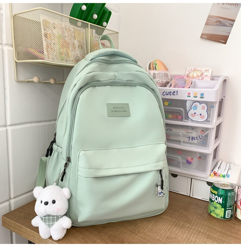 Schoolbags Student Japanese And Versatile Backpack Unisex Large-Capacity Backpack Girl Simple Polyester Material Doll Decoration