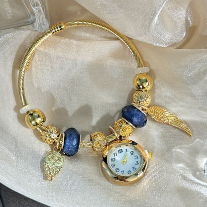 Cross-border Gold Bracelet Watch Adjustable opening Alloy bracelet Quartz Watch Beaded Small flower bracelet Watch