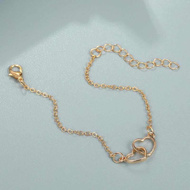 Pulseira Estilo Simples Vendas Coração a Coração Combinando Dupla Pequena Pulseira de Coração Oco Moda 2024 Novo Temperamento