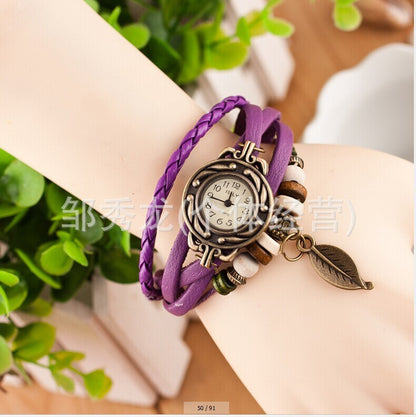 Foreign trade hot selling retro cowhide wrapped bracelet watch, ladies' delicate watch, leaf and leaf pendant decoration, studen