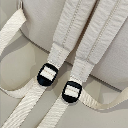 Backpack, large capacity, adjustable shoulder straps, suitable for school, campus travel, and work, with a secure zipper closure