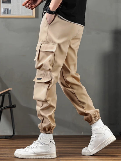 Spring and autumn windproof and waterproof outdoor pants, hiking workwear pants for men, loose and thin underwear for men and wo