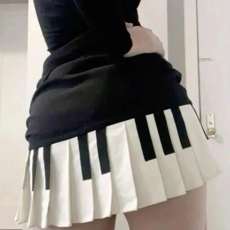 Sweet and spicy style black and white piano vintage pleated skirt for women's spring new design sense slimming and form-fitting