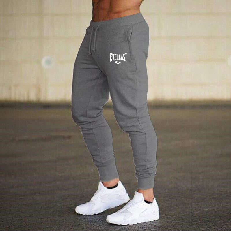 Novas Calças Estampadas de Outono EVERLAST Masculino/Feminino Calças de Corrida Calças de Moletom Esportivas Casuais Calças de Fitness Academia Respiráveis
