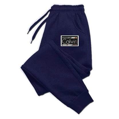 Calças de Moletom Masculinas e Femininas Casuais de Alta Qualidade Luxuosas Calças de Jogging Versáteis Macias Vendas Quentes Calças Estampadas com Elástico na Cintura