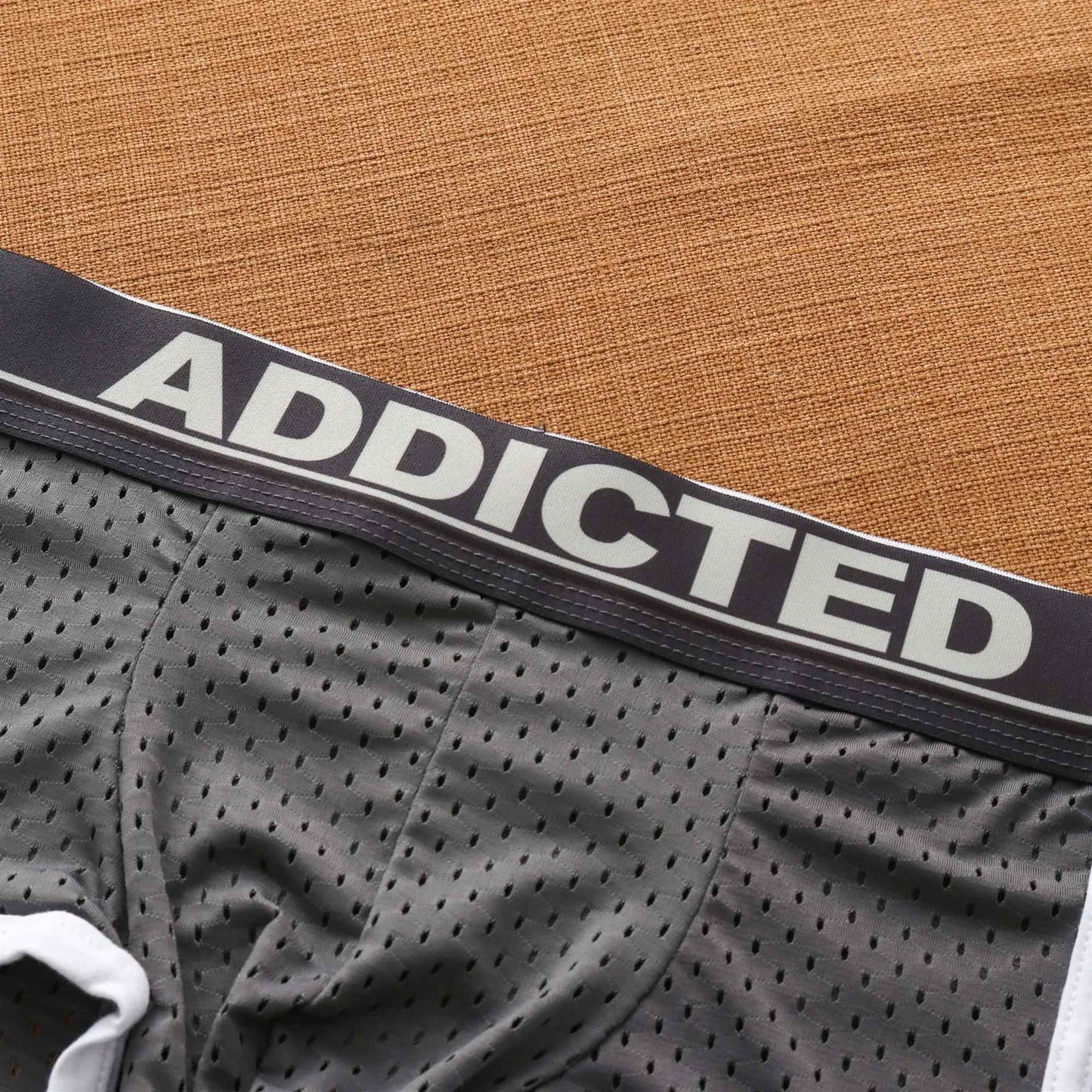 Men's panties, low rise breathable ice silk mesh comfortable tide boxers