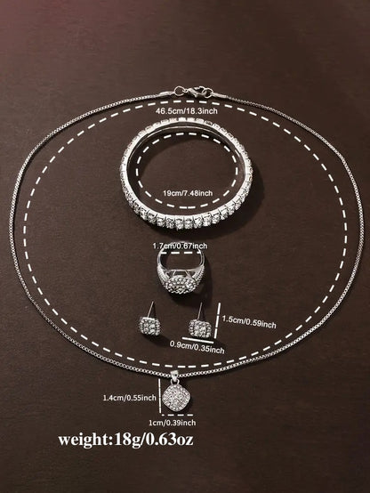 Luxurious ladies' quartz watch and jewelry set with intricate engravings, a birthday gift, and an elegant outfit for a party.