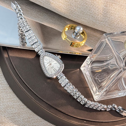 Women's diamond-set snakehead alloy case Sun stripe stripe scale diamond-set fine bracelet quartz watch luxury women's watch