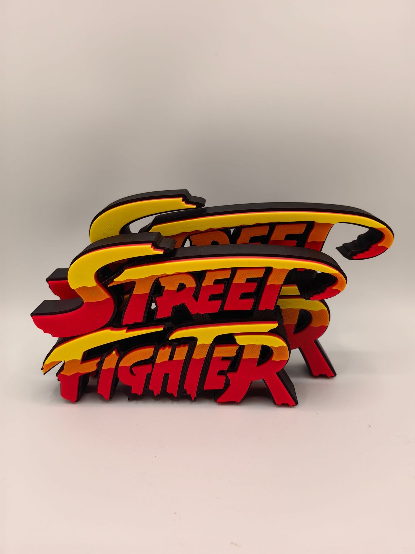Street Fighter, Street Fighter (abbreviation), arcade game, Street Fighter Logo, signboard, action figure, ornament.