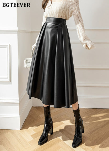 BGTEEVER Spring Autumn Loose PU Leather A-line Skirts Women Elegant High Waist Pleated Faux Leather Skirts Female