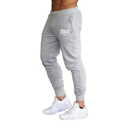 Novas Calças Estampadas de Outono EVERLAST Masculino/Feminino Calças de Corrida Calças de Moletom Esportivas Casuais Calças de Fitness Academia Respiráveis
