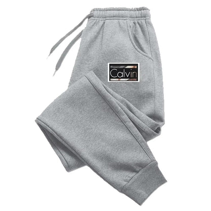 Calças de Moletom Masculinas e Femininas Casuais de Alta Qualidade Luxuosas Calças de Jogging Versáteis Macias Vendas Quentes Calças Estampadas com Elástico na Cintura