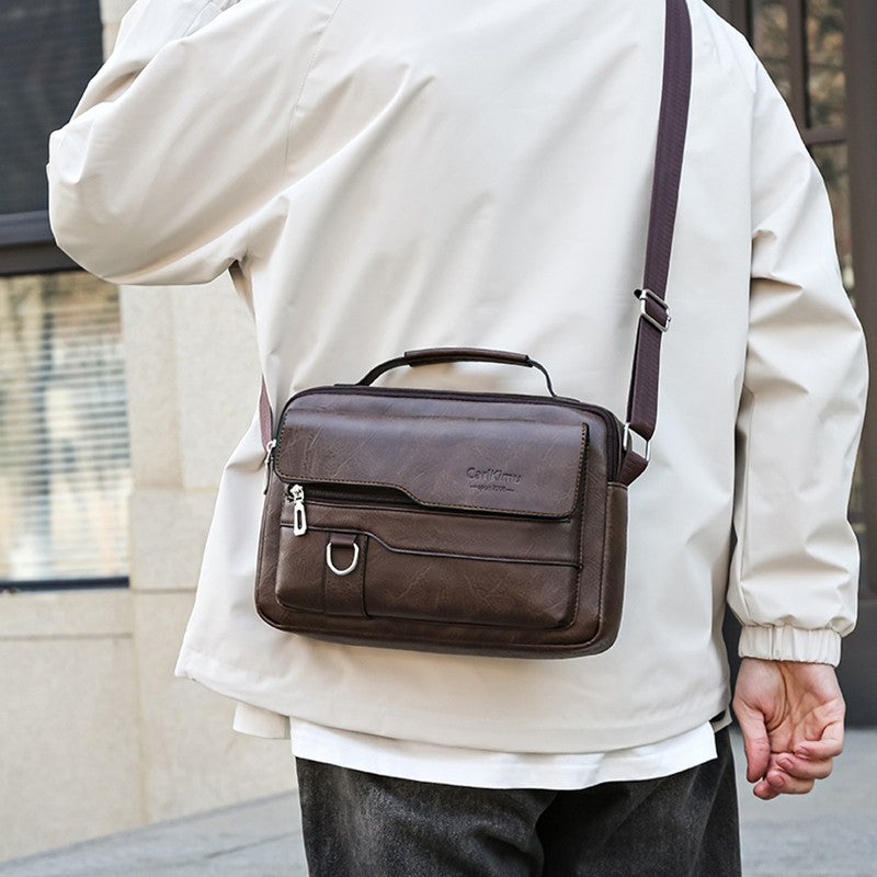 Men's and women's cross-body and shoulder bag for business, simple and casual, with minimalist design. Made of PU material.