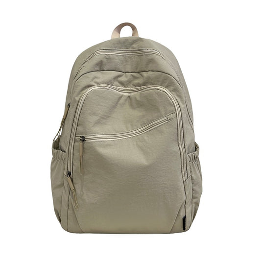 Backpack, large capacity, adjustable shoulder straps, suitable for school, campus travel, and work, with a secure zipper closure