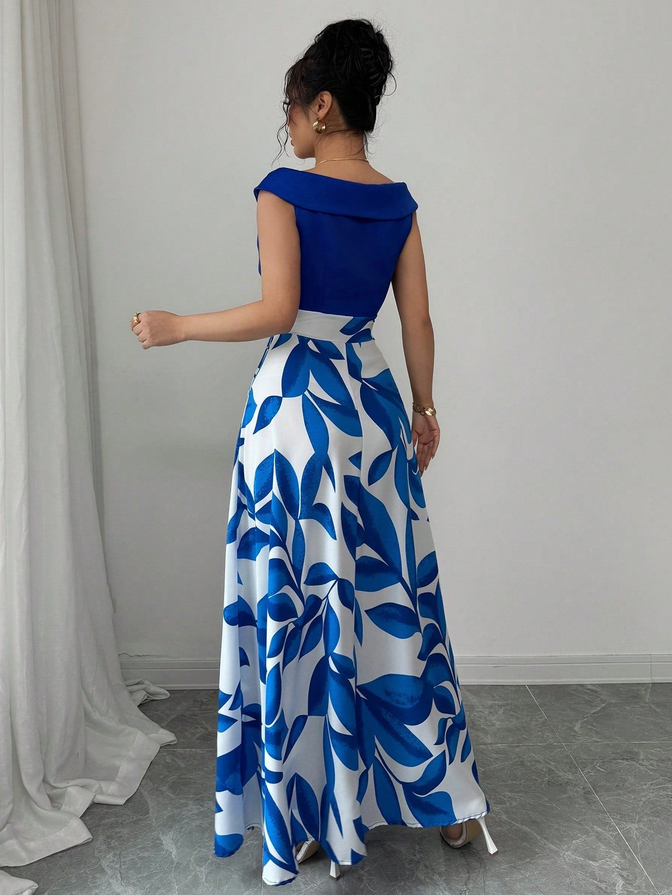 Women's Blue White Floral Maxi Dress Asymmetric Neckline Color Block Design Ideal for Evening Events Garden Parties Elegant Styl
