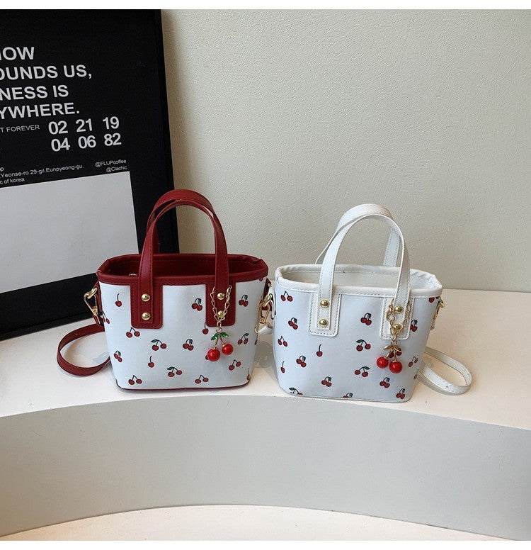 Women PU Cherry Shoulder Bag Large Capacity Trendy Commuting Bag with Cherry Pendant Stylish Crossbody Bag Aesthetic Handbag