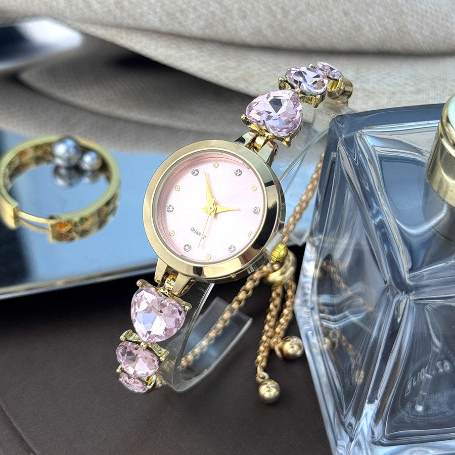 Ladies' quartz watch with three heart-shaped diamond-encrusted bracelet round alloy case and mixed scale simple light luxury