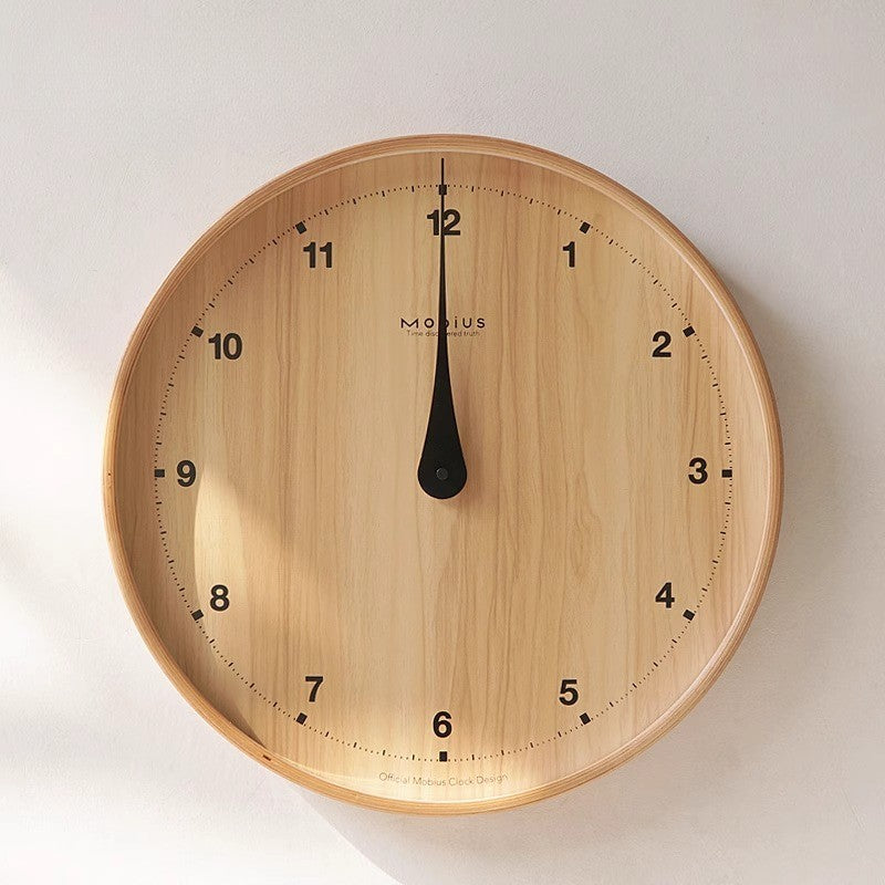 The original wood grain silent and simple wooden wall clock is a fashionable home decoration for the living room clock
