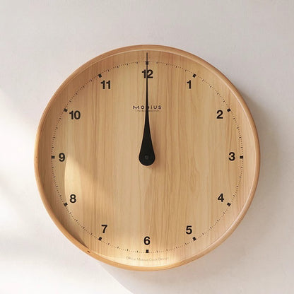 The original wood grain silent and simple wooden wall clock is a fashionable home decoration for the living room clock