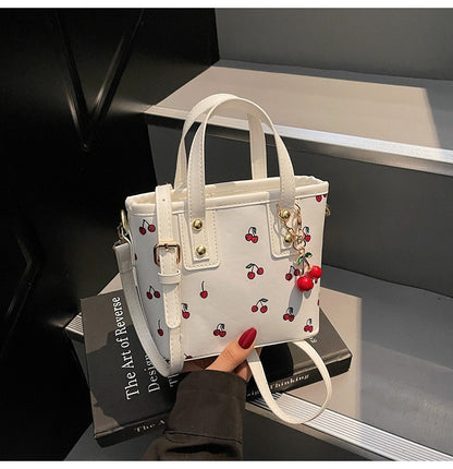 Women PU Cherry Shoulder Bag Large Capacity Trendy Commuting Bag with Cherry Pendant Stylish Crossbody Bag Aesthetic Handbag