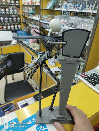 Coleção de Brinquedos 25º Aniversário: Boneco Articulado de Luxo Jack Skellington de O Estranho Mundo de Jack com Cabeças Intercambiáveis